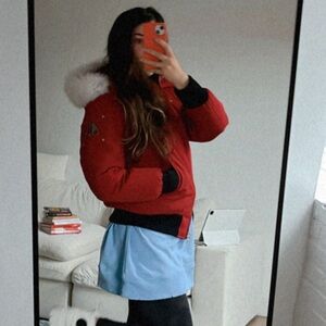 Moose Knuckles Red Puffer Jacket with White Fur Hood